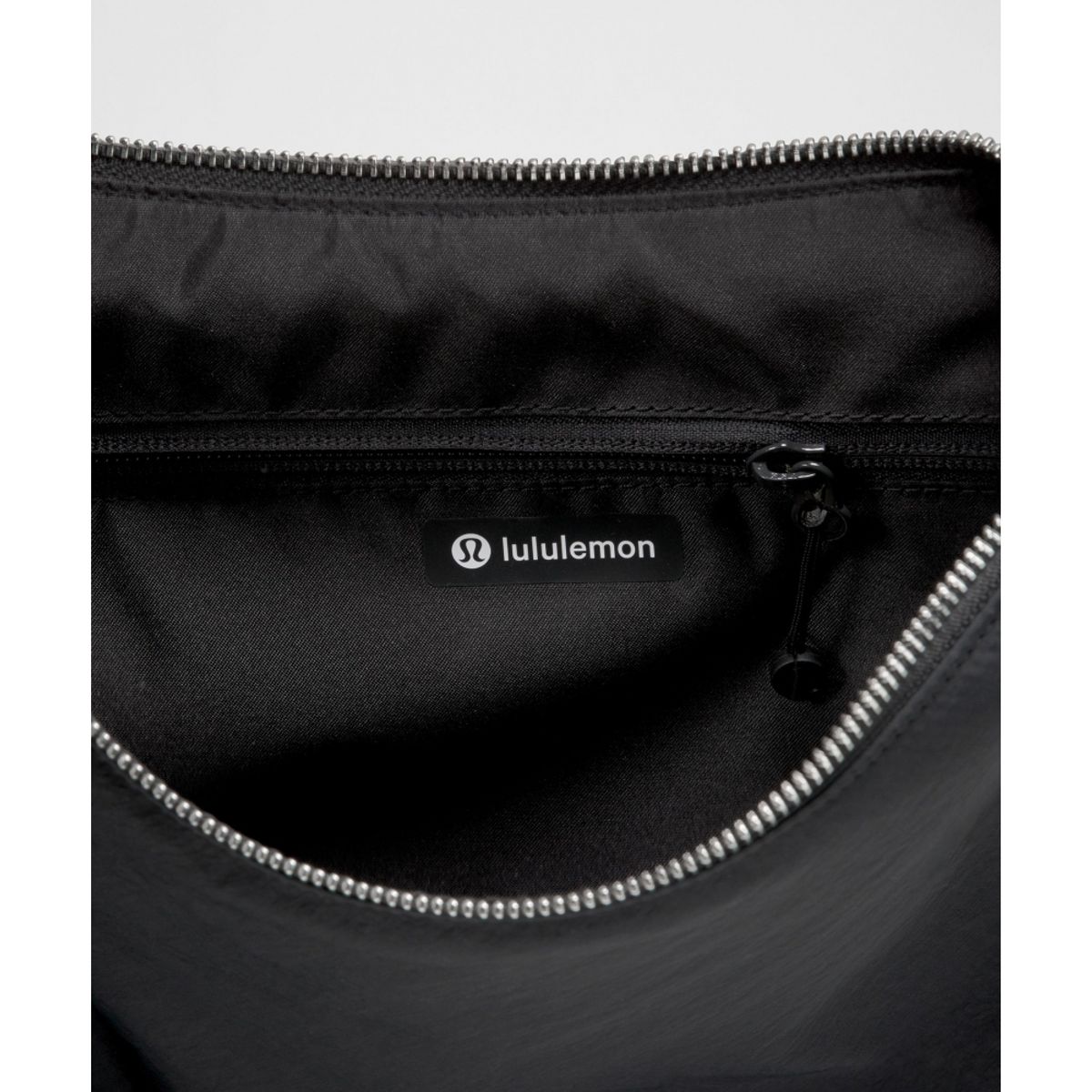 룰루레몬(LULULEMON) 컨버터블 루시드 크로스바디 백 6.5L  BLK BLK SLVR