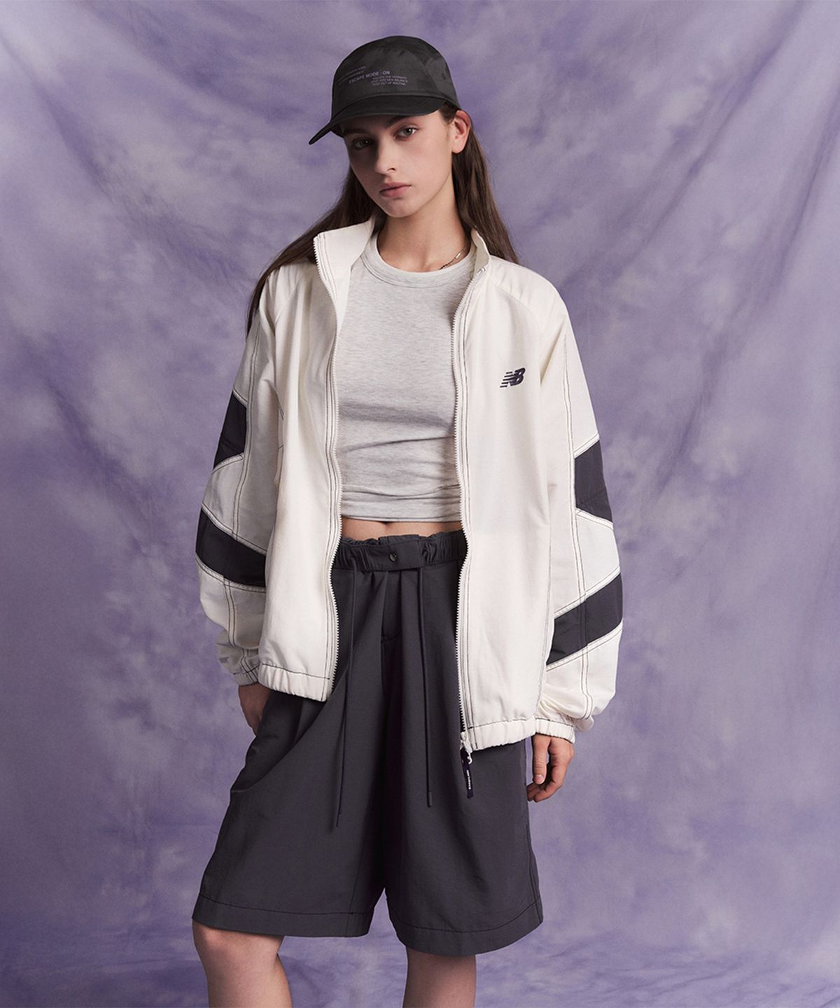 뉴발란스(NEW BALANCE) NBNAG31833 / UNI ESCAPE 스탠넥 웜업자켓 (IVORY)