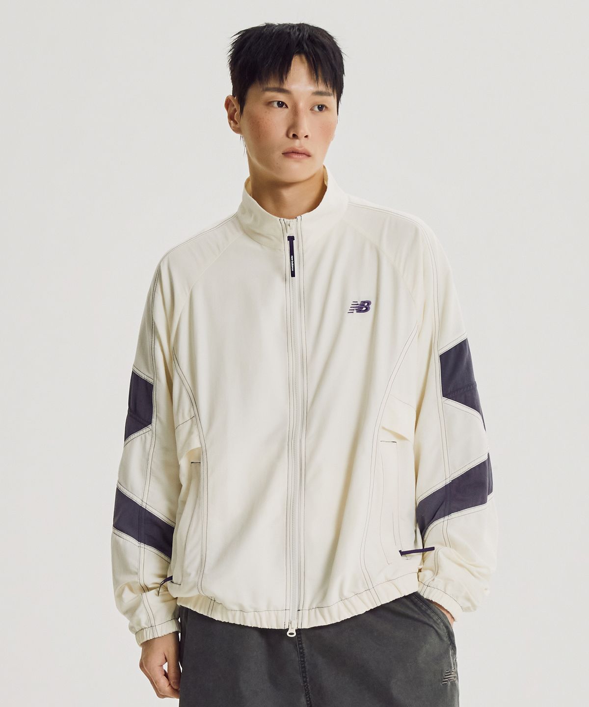 뉴발란스(NEW BALANCE) NBNAG31833 / UNI ESCAPE 스탠넥 웜업자켓 (IVORY)