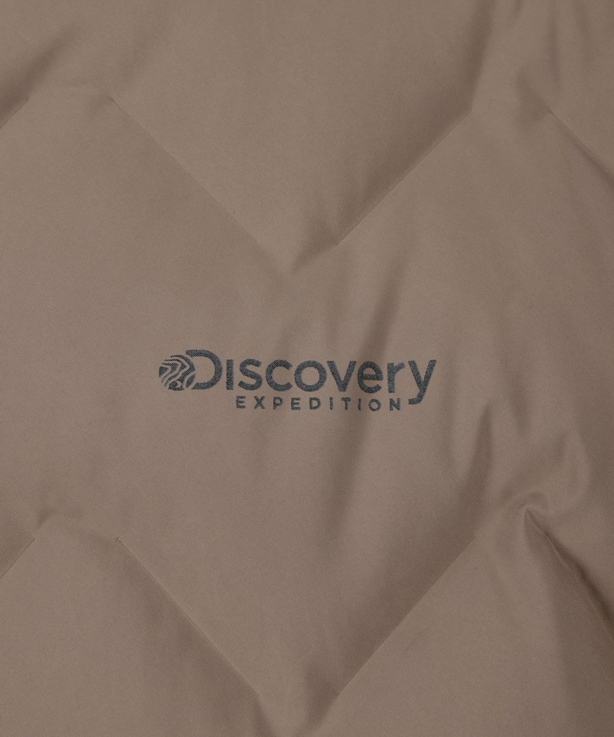디스커버리 익스페디션(DISCOVERY EXPEDITION) 남성 티베른 튜브 구스다운 경량패딩 (Brown)