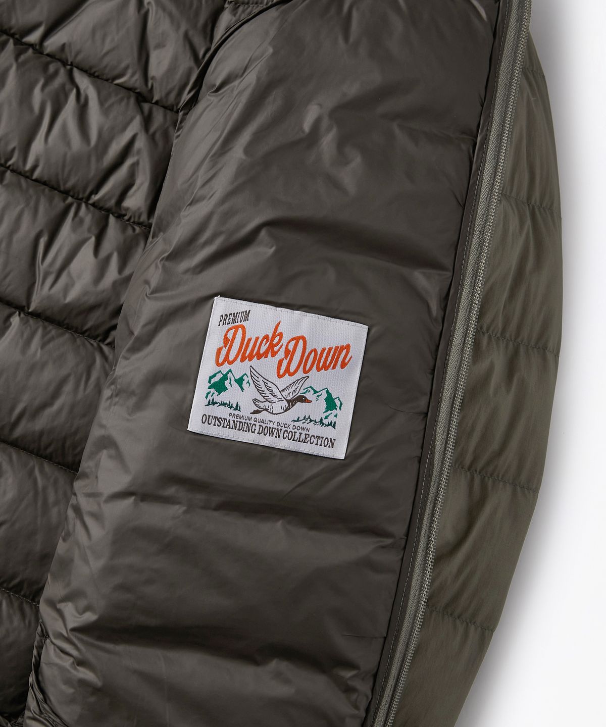 아웃스탠딩(OUTSTANDING) PCU FEATHERED DOWN JACKET_D.BEIGE