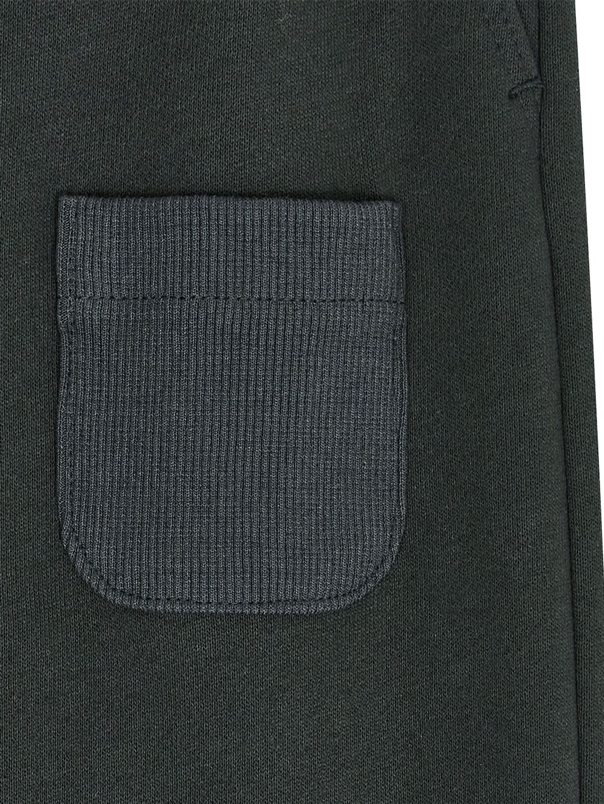 뚜오미오(TUOMIO) ROLL-UP BUTTON SWEATPANTS [CHARCOAL]