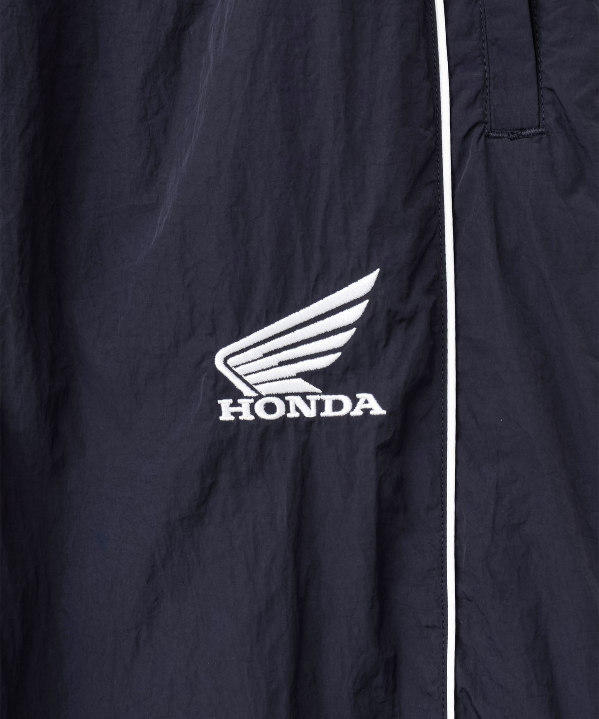 핍스 모터사이클(PHYPS MOTORCYCLE) [김간지 X 핍스 모터사이클] Basic Logo Nylon Track Pants Navy