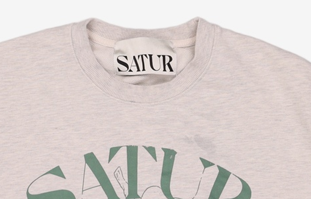세터(SATUR) 카프리 시트론 드로잉 그래픽 스웨트셔츠 멜란지 오트밀 L