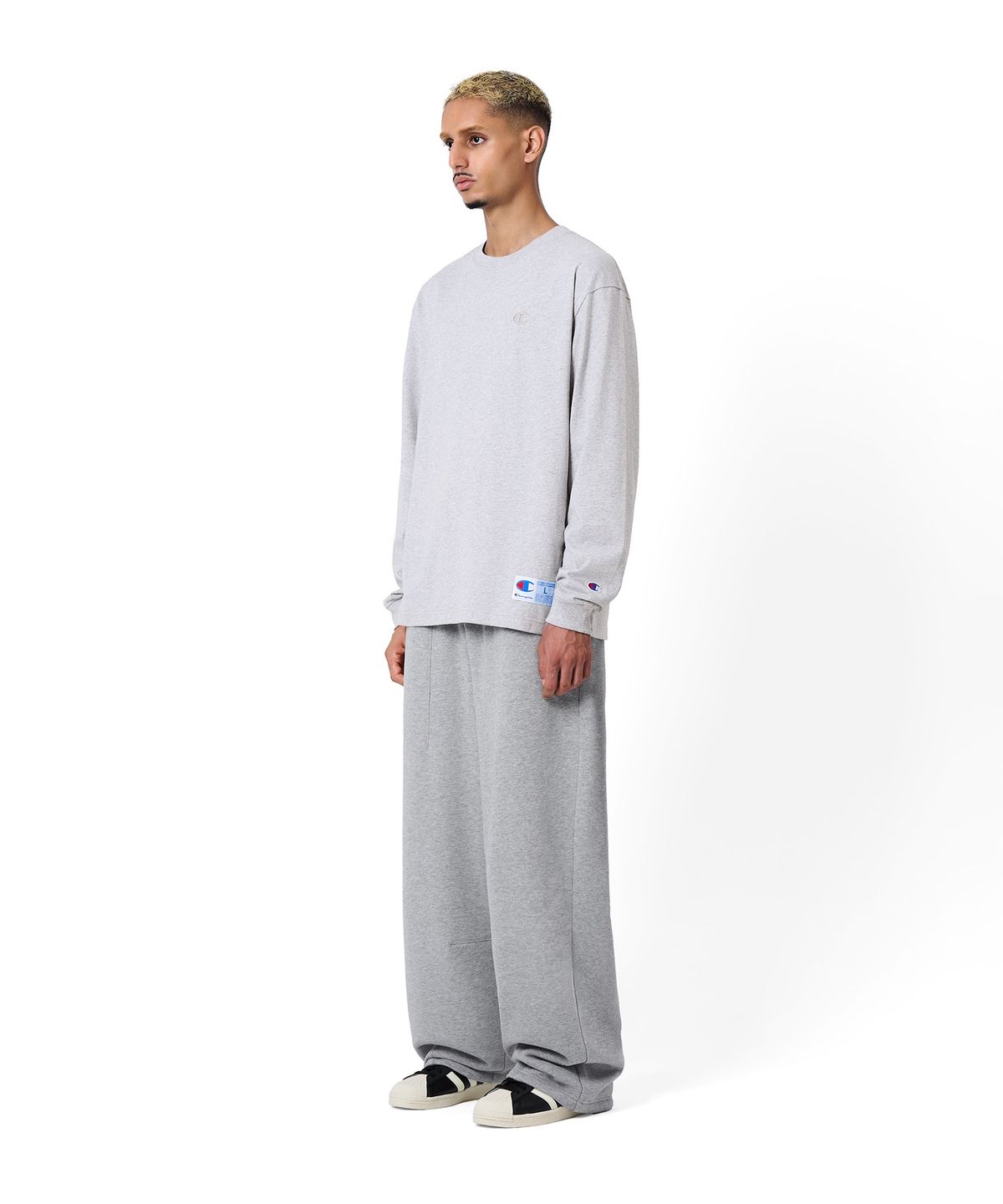 챔피온(CHAMPION) C로고 오버핏 조그택 롱슬리브 티셔츠 Light Grey
