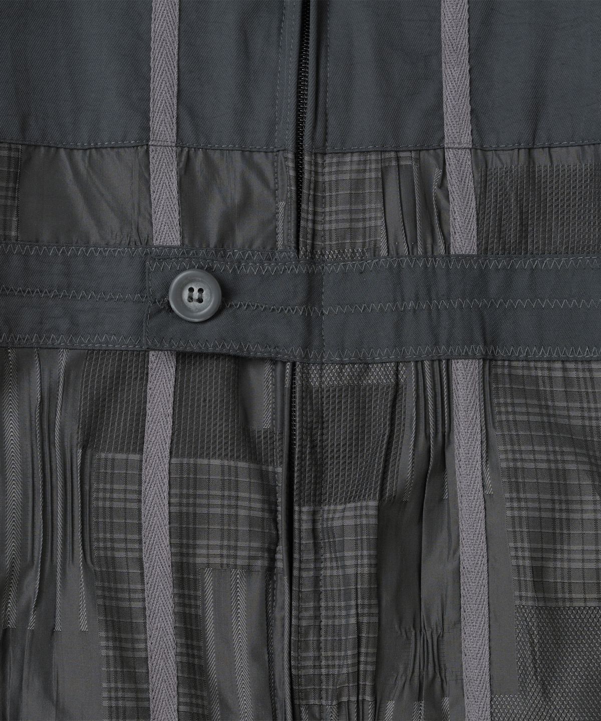 더콜디스트모먼트(THE COLDEST MOMENT) TCM patchwork pattern windstopper (black)