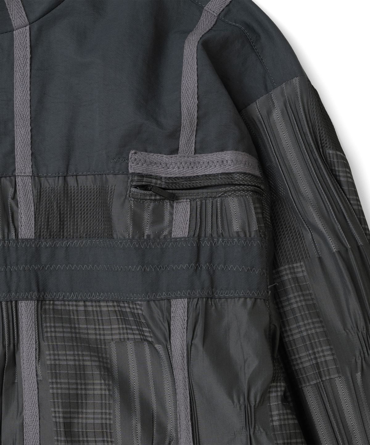더콜디스트모먼트(THE COLDEST MOMENT) TCM patchwork pattern windstopper (black)