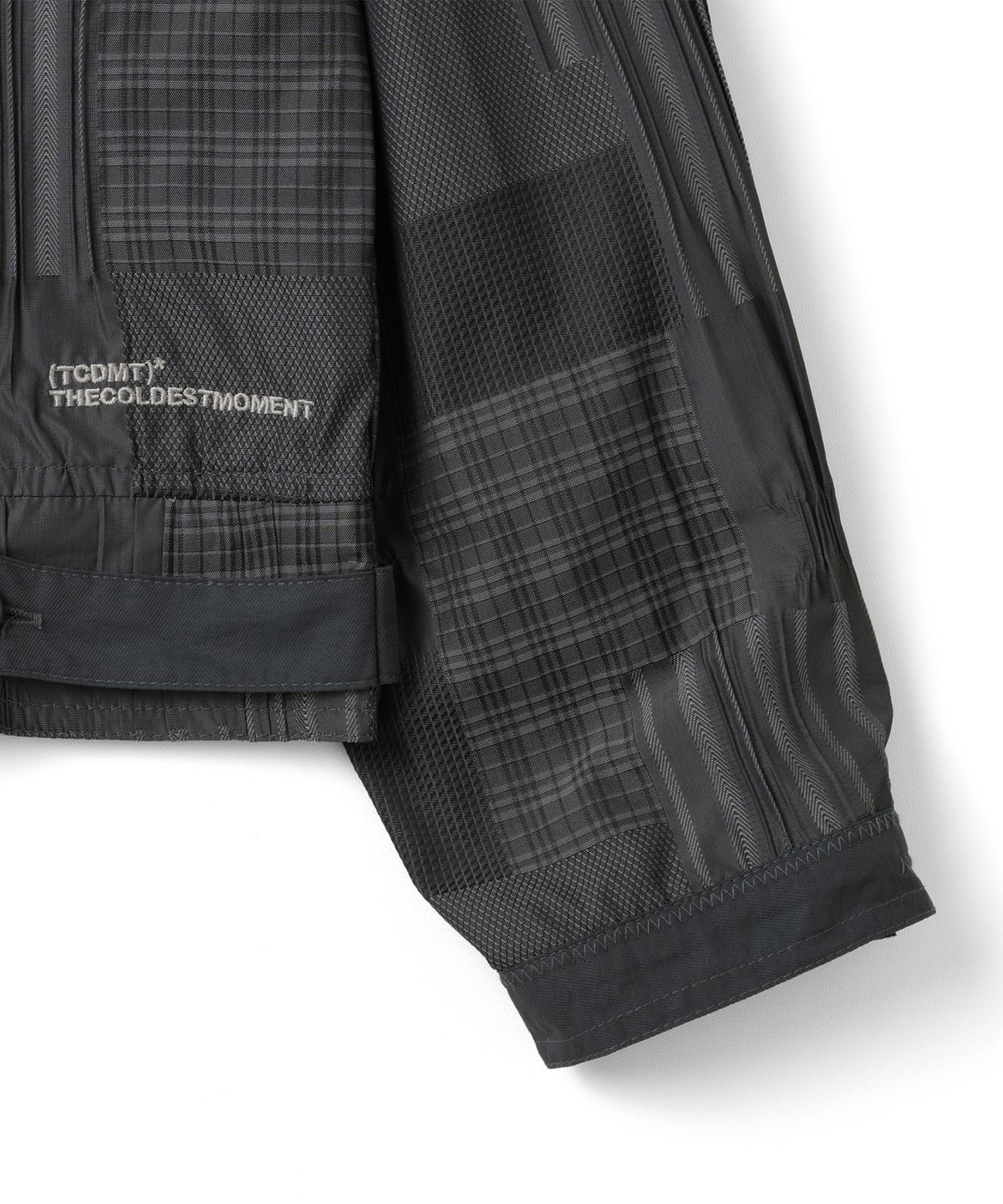 더콜디스트모먼트(THE COLDEST MOMENT) TCM patchwork pattern windstopper (black)