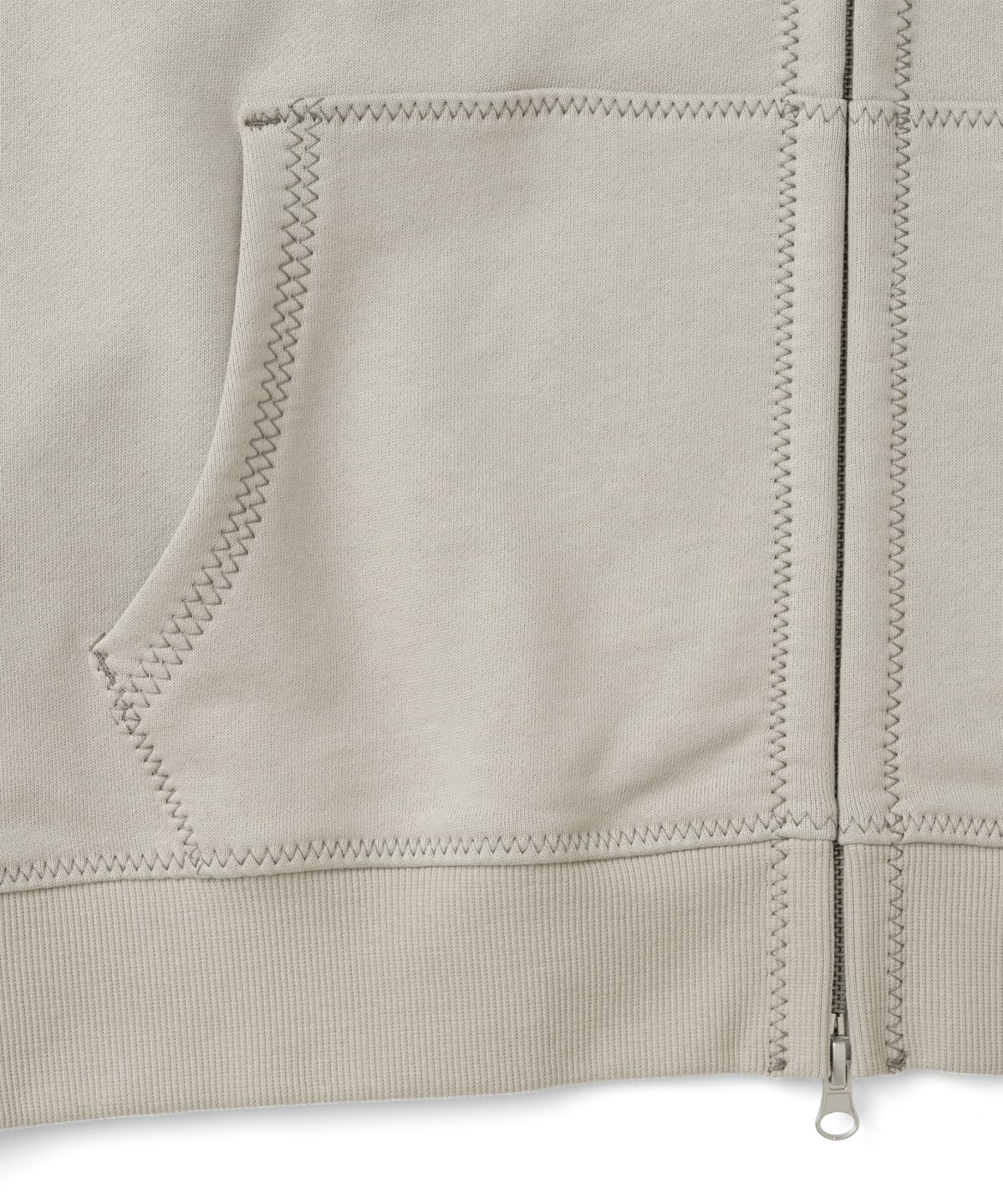 더콜디스트모먼트(THE COLDEST MOMENT) TCM zigzag stitch hooded zip-up (sand beige)
