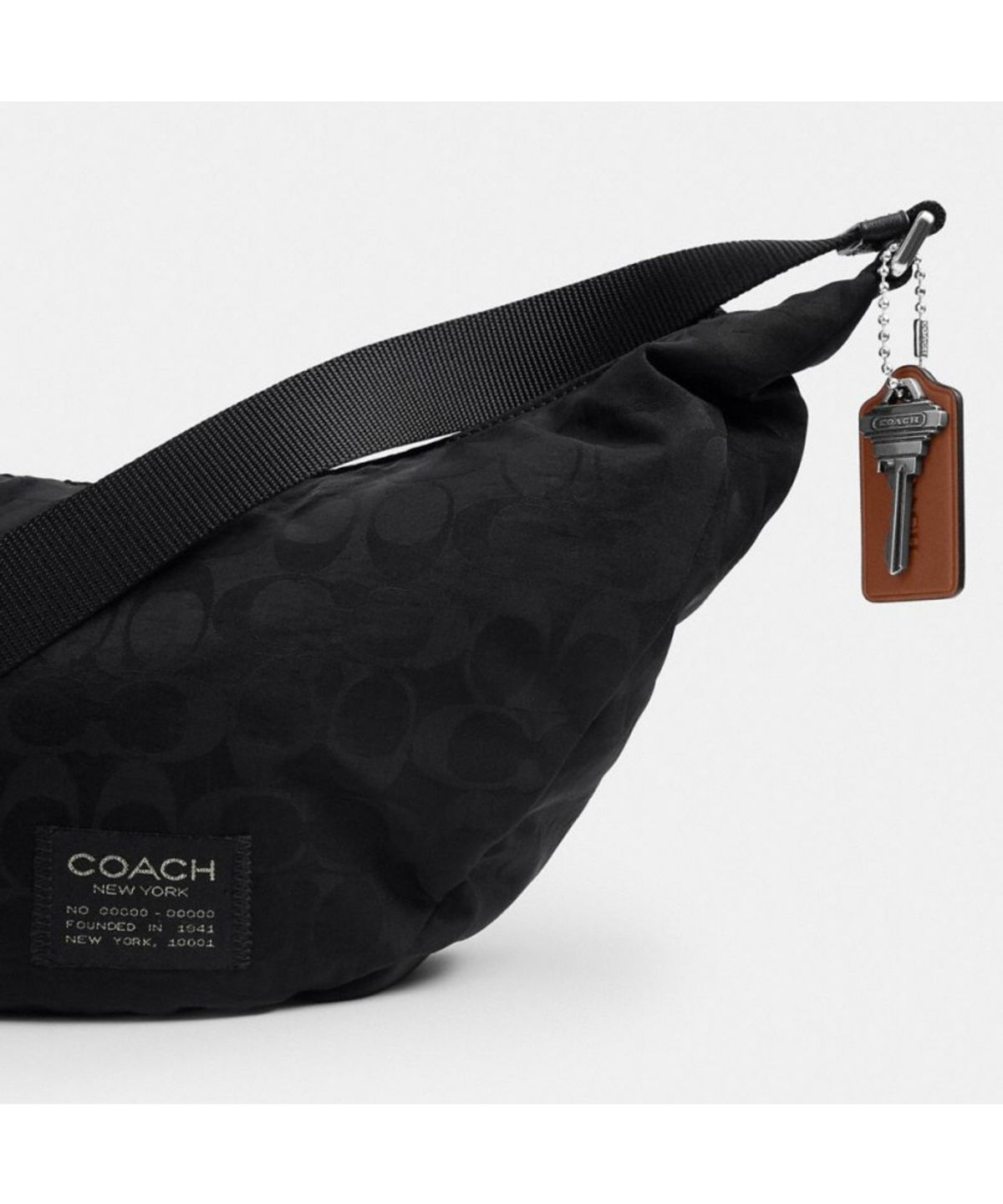 코치(COACH) 레온 슬링 백 인 시그니처 나일론 자카드 CFN99 BLK