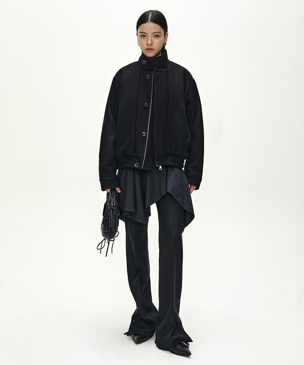 앤더슨벨(ADSB ANDERSSON BELL) ASYMMETRIC WRAP SKIRT-LAYERED BOOTCUT TROUSERS (NAVY/BLACK)