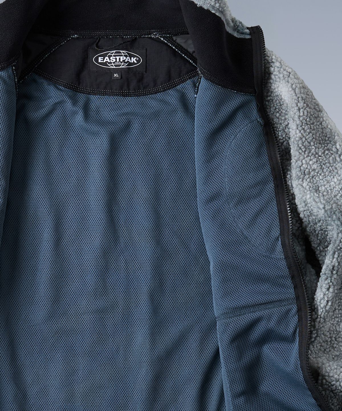 이스트팩(EASTPAK) 하이넥 쉐르파 플리스 집업 GREY
