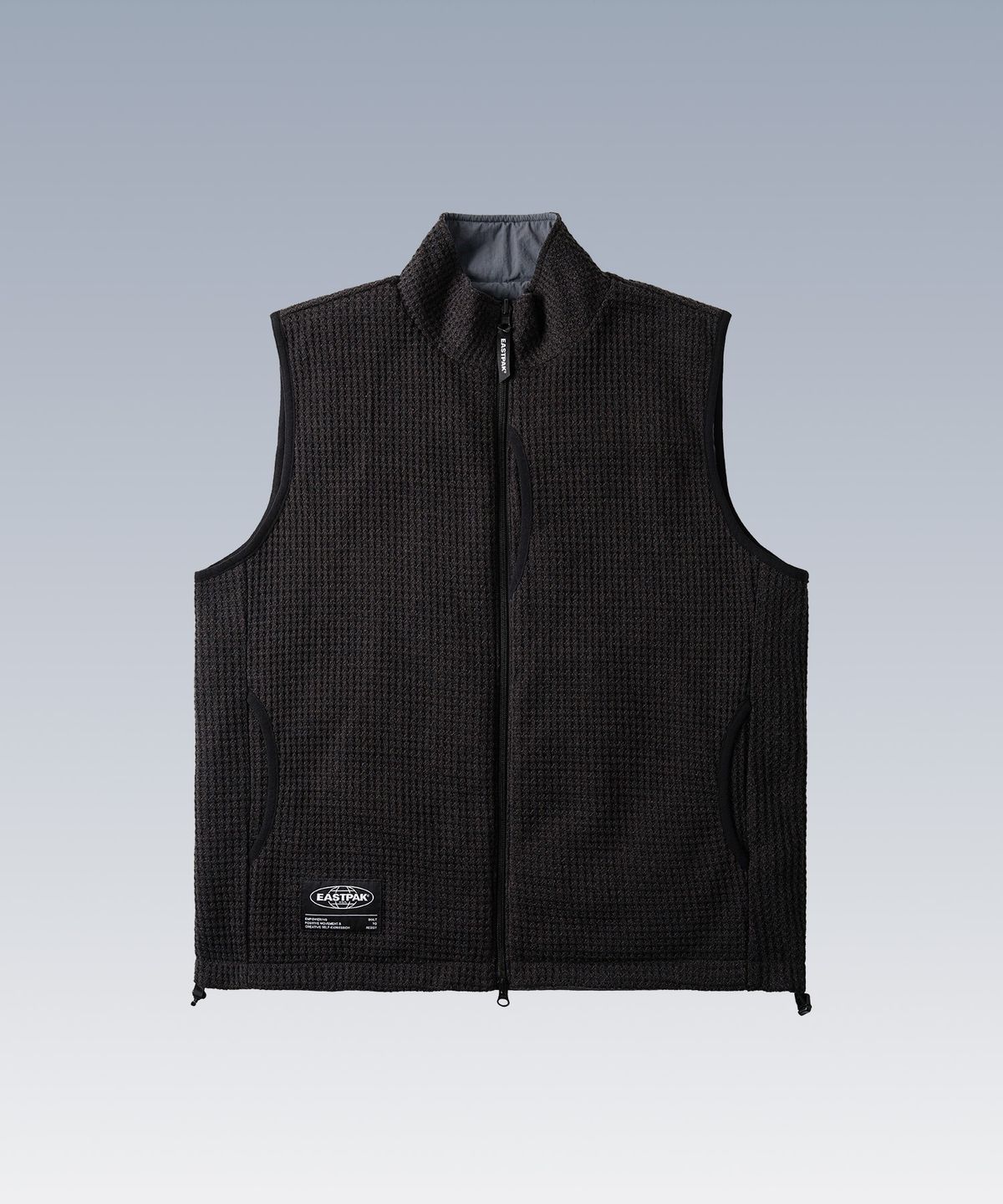 이스트팩(EASTPAK) 리버시블 플리스 베스트 GREY
