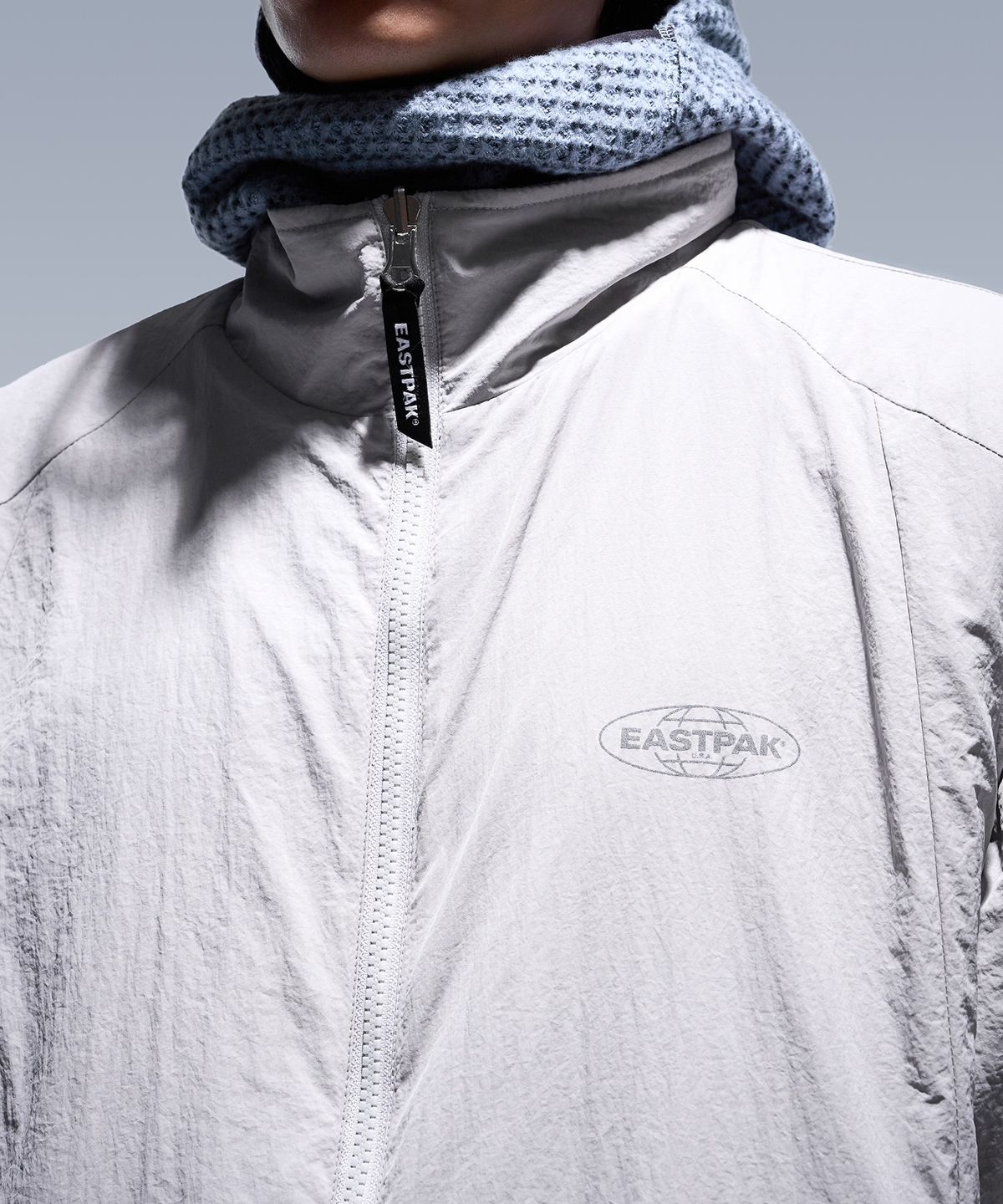 이스트팩(EASTPAK) 리버시블 자켓 LIGHT GREY