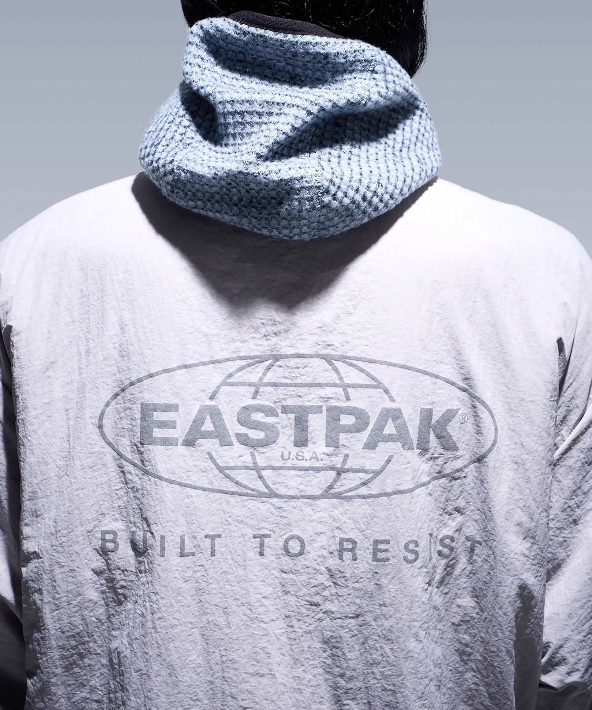 이스트팩(EASTPAK) 리버시블 자켓 LIGHT GREY