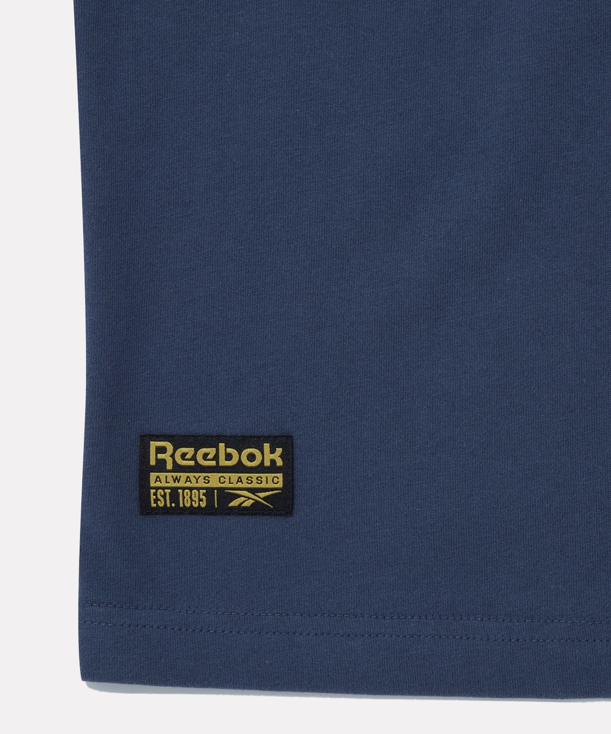 리복(REEBOK) 베이직 로고 워싱 반팔티 - 인디고 네이비