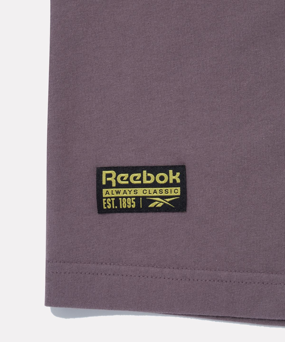 리복(REEBOK) 베이직 로고 워싱 반팔티 - 인디고 와인