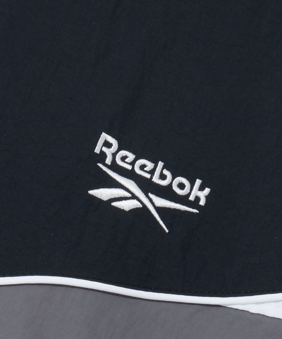 리복(REEBOK) 헤리티지 윈드 브레이커 v26 - 블랙:그린