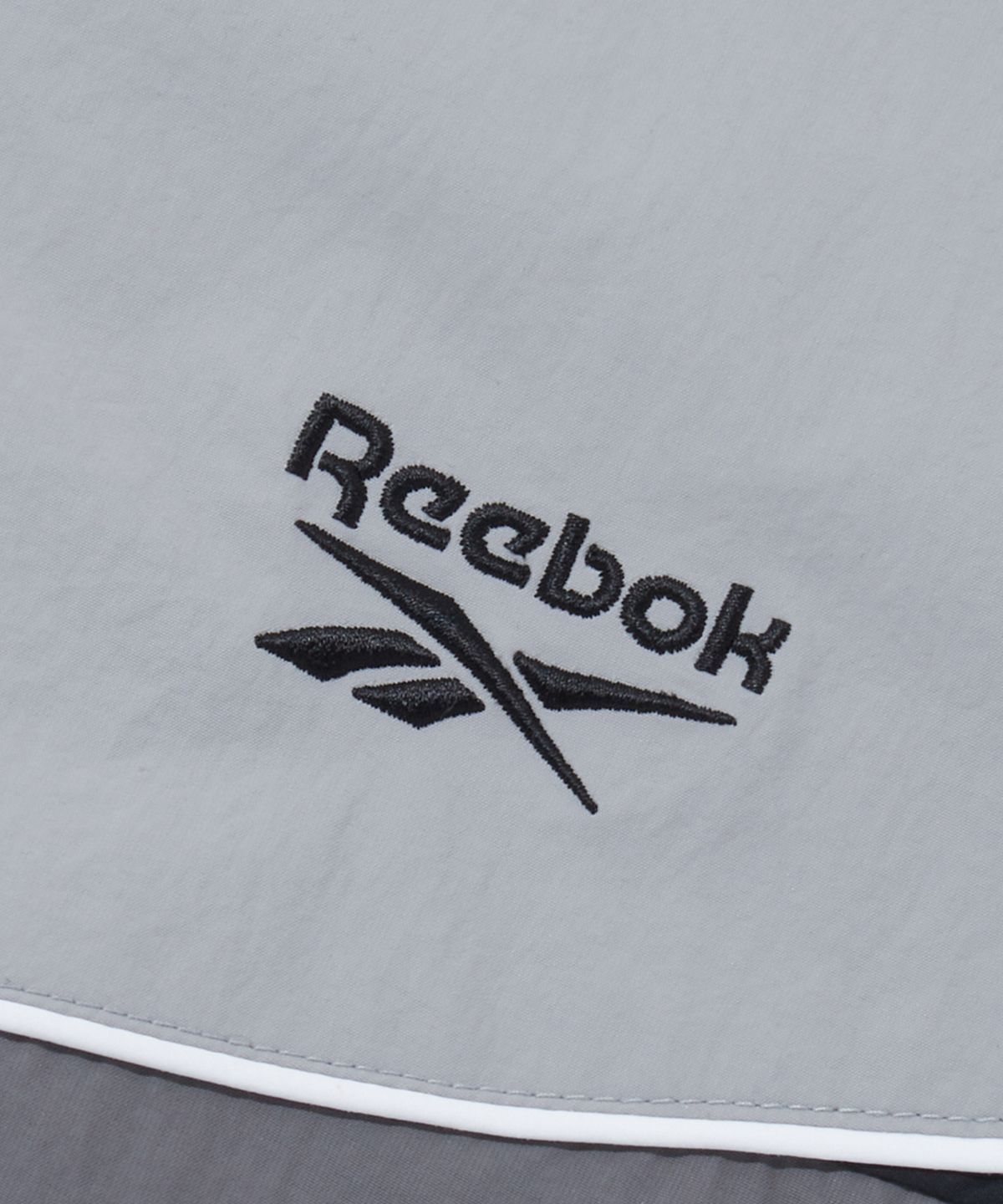 리복(REEBOK) 헤리티지 윈드 브레이커 v26 - 그레이