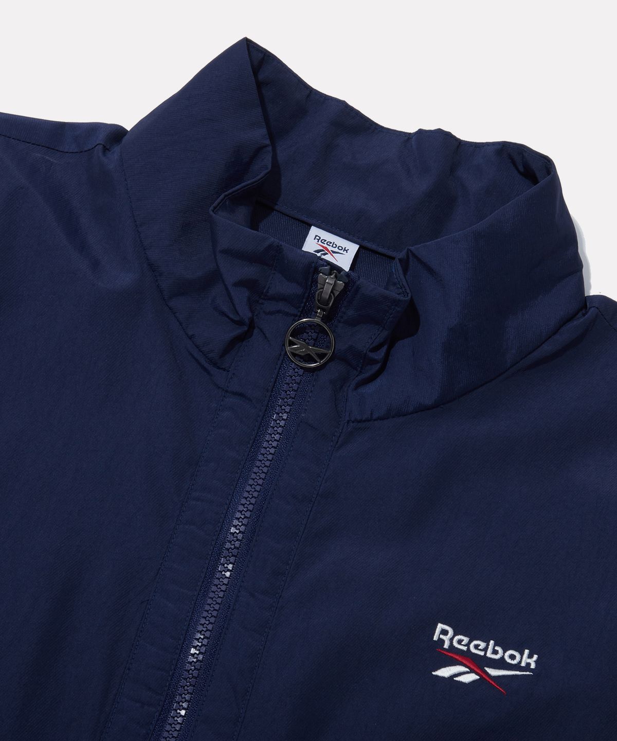 리복(REEBOK) DNA 트랙 아노락 - 네이비