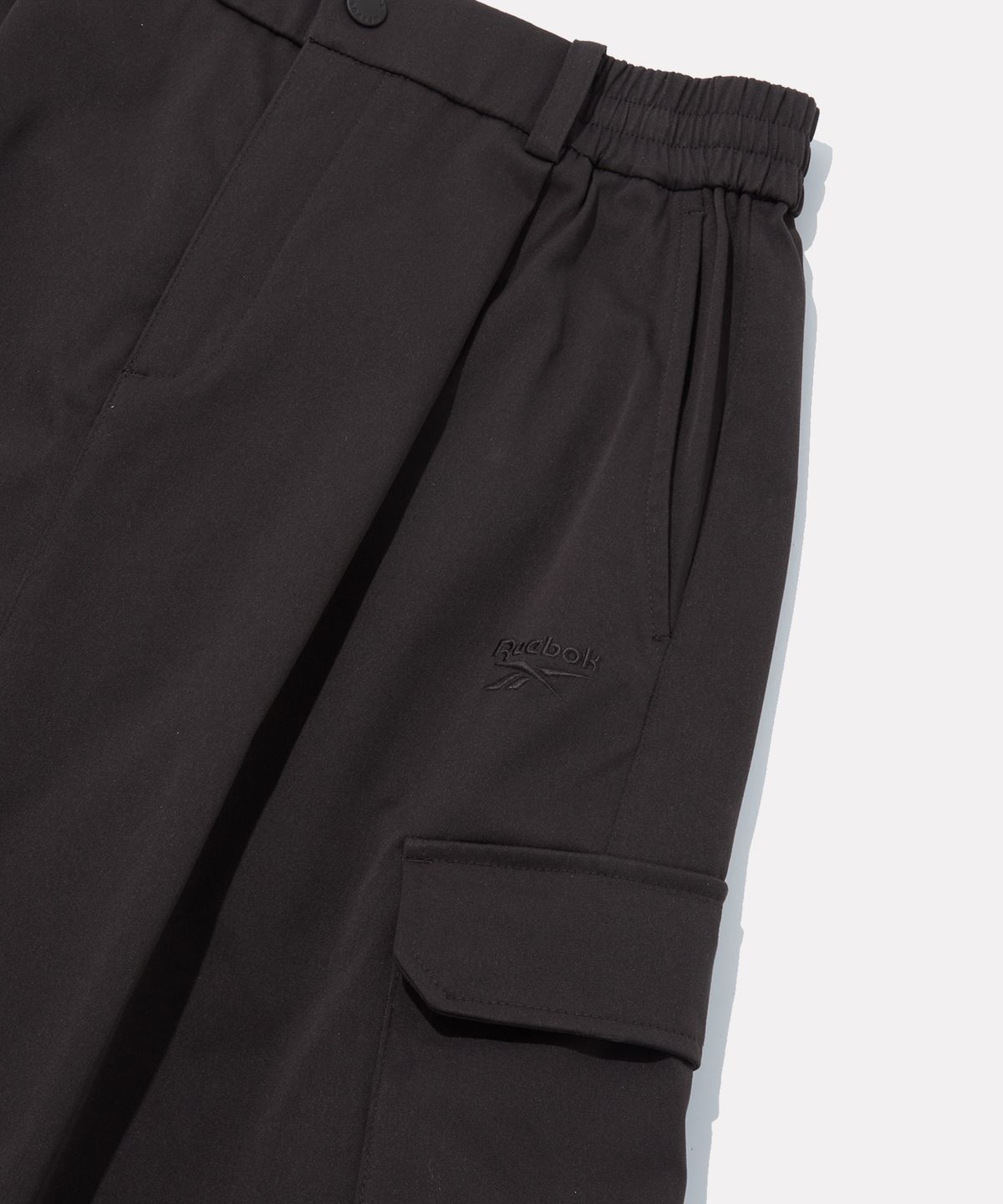 리복(REEBOK) 스트레치 카고 스커트 (W) - 다크 브라운