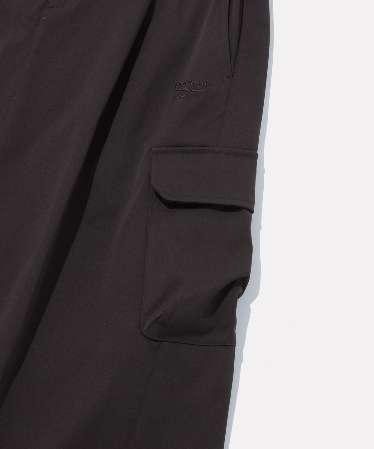 리복(REEBOK) 스트레치 카고 스커트 (W) - 다크 브라운