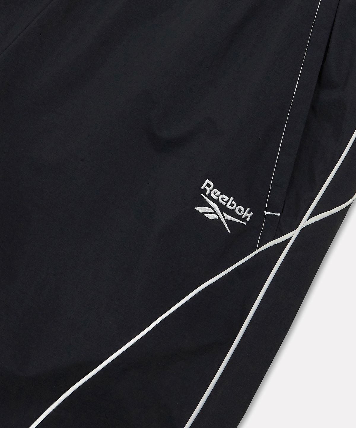 리복(REEBOK) 프리미어 우븐 트랙 팬츠 (W) - 블랙