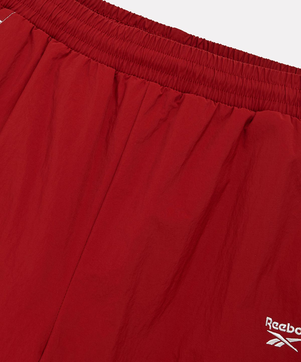 리복(REEBOK) 프리미어 우븐 트랙 팬츠 (W) - 다크 레드