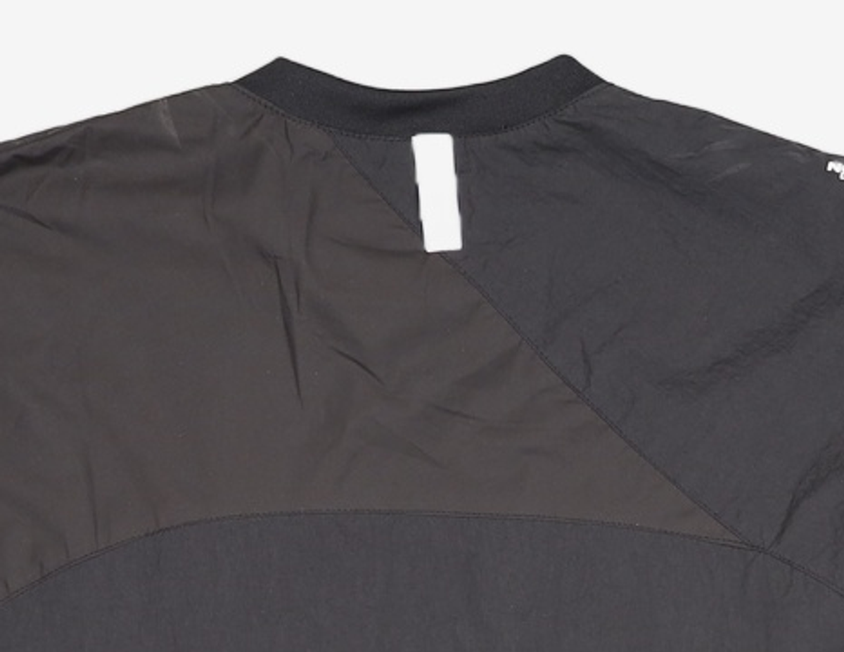 노매뉴얼(NOMANUAL) SLICED WARM-UP TOP - BLACK L