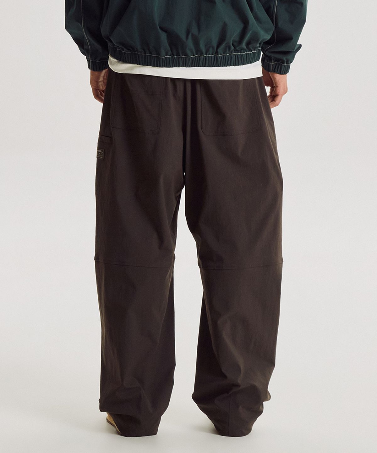 뉴발란스(NEW BALANCE) NBNTG31853 / UNI 모닝레이브 우븐 와이드 커브드 팬츠 (BROWN)