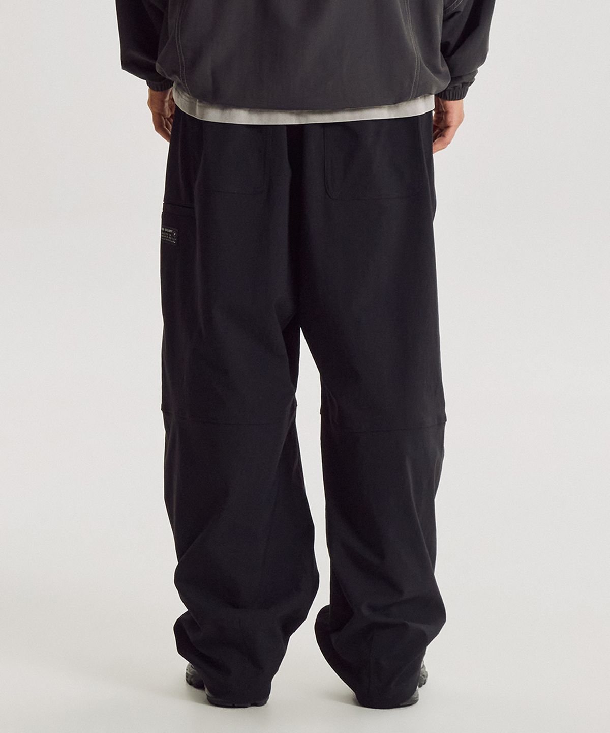 뉴발란스(NEW BALANCE) NBNTG31853 / UNI 모닝레이브 우븐 와이드 커브드 팬츠 (BLACK)