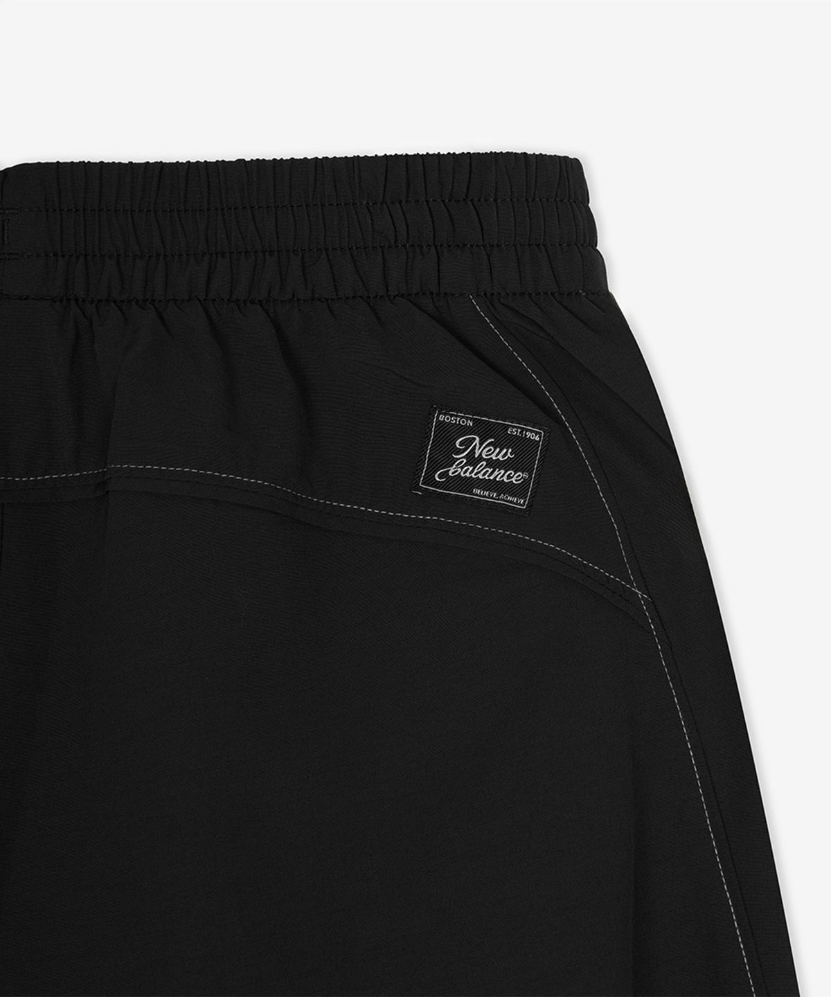 뉴발란스(NEW BALANCE) NBNTG3W812 / WOMEN 에센셜 웜업 우븐 와이드팬츠 (BLACK)