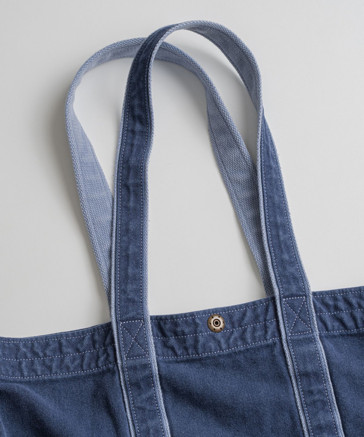 비헤비어(BEHEAVYER) DYED CANVAS TOTE BAG blue