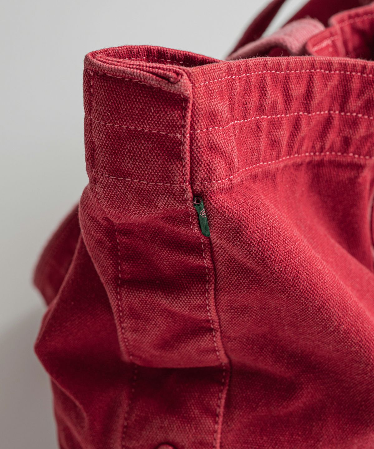 비헤비어(BEHEAVYER) DYED CANVAS TOTE BAG red