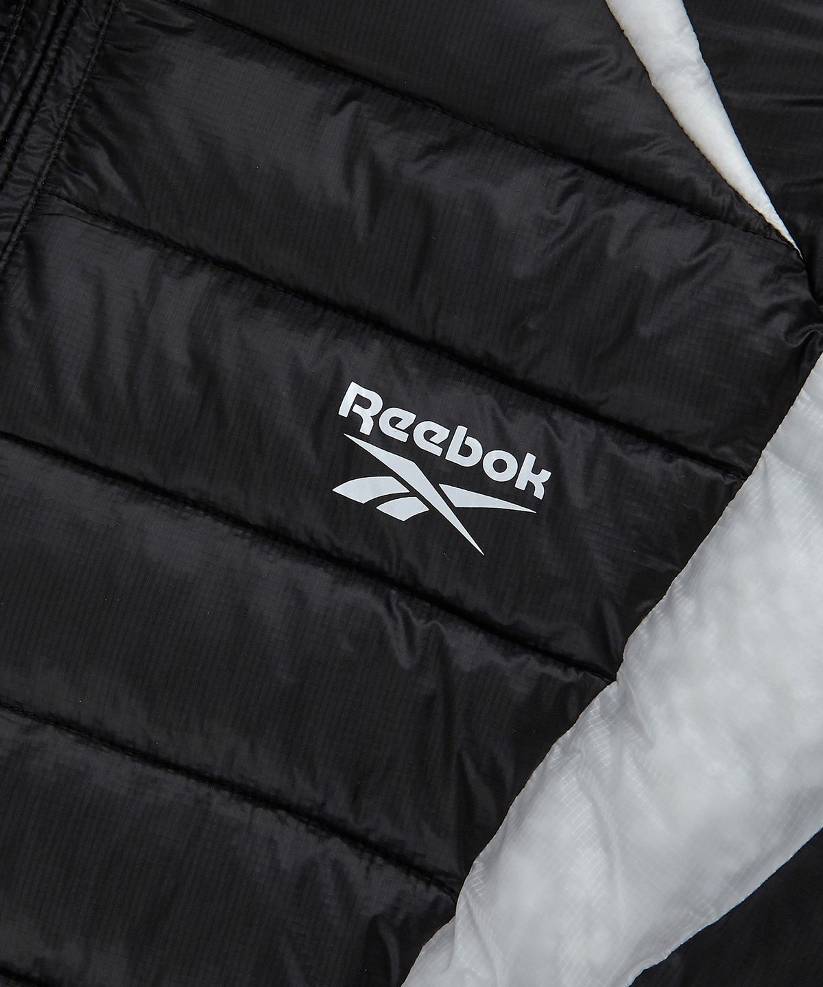 리복(REEBOK) DMX AIR 패딩 - 쉐도우 블랙