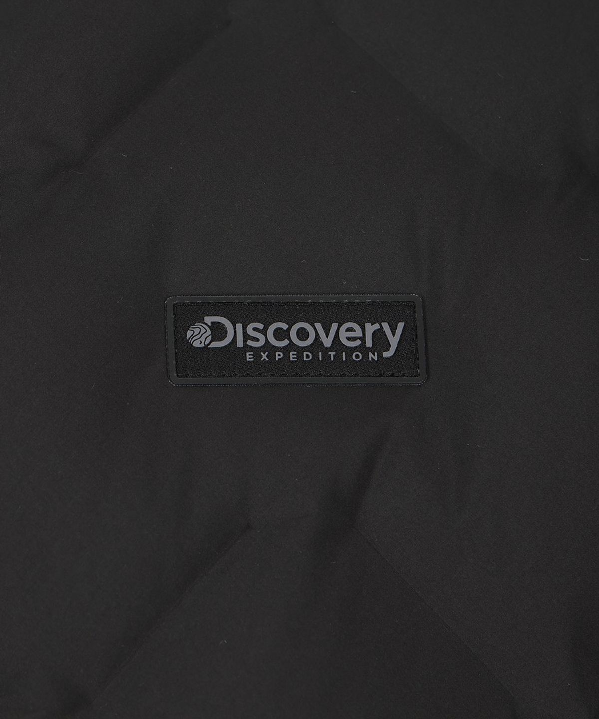 디스커버리 익스페디션(DISCOVERY EXPEDITION) 여성 티베른 크롭 튜브 구스다운 경량패딩 (BLACK)