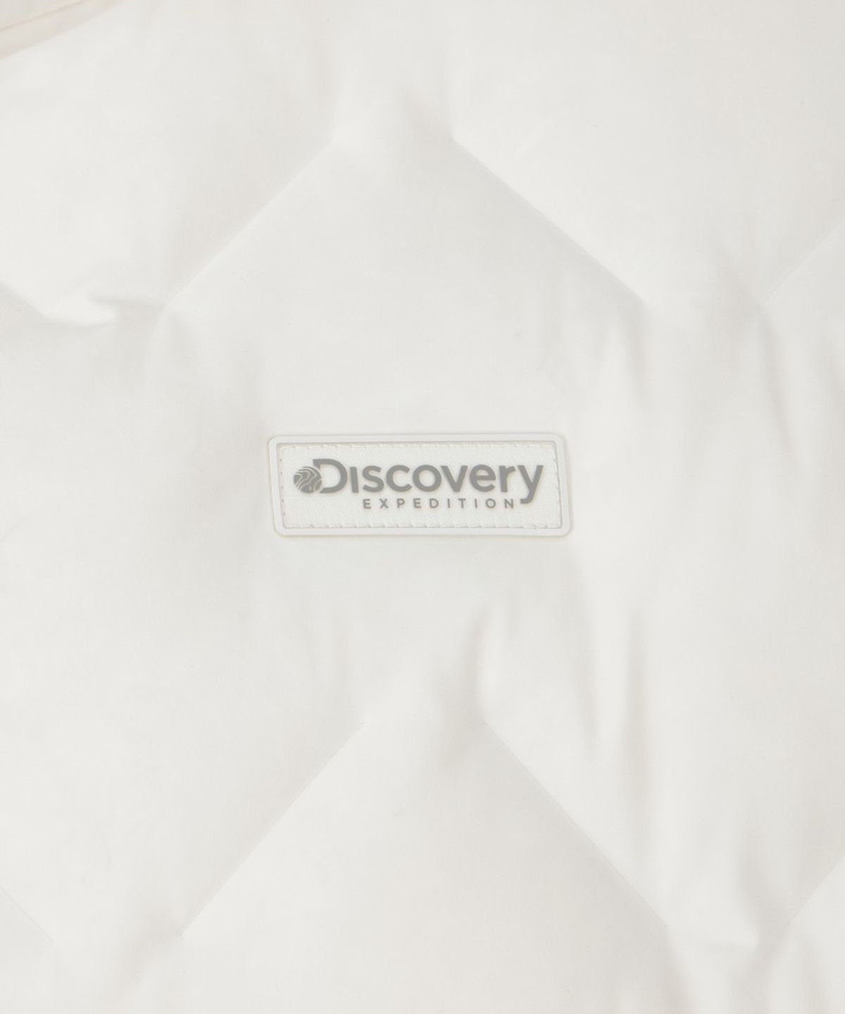 디스커버리 익스페디션(DISCOVERY EXPEDITION) 여성 티베른 크롭 튜브 구스다운 경량패딩 (CREAM)
