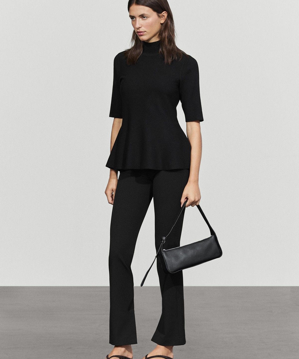 마시모두띠(MASSIMO DUTTI) 페플럼 디테일 니트 탑