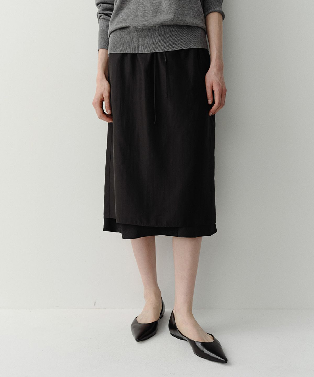 이아(EAAH) SHEER LAYERED BANDING SKIRT (BLACK)