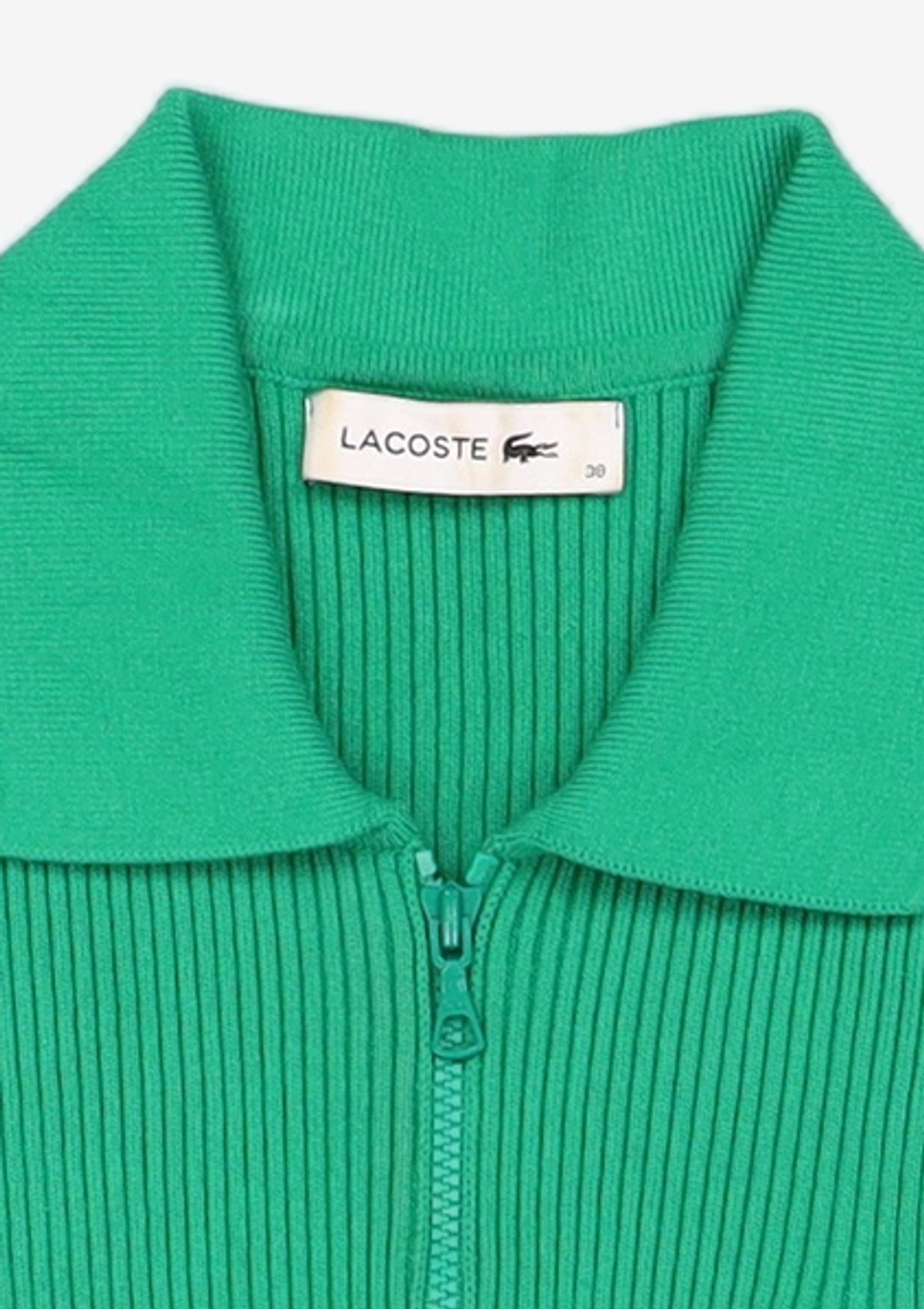 라코스테(LACOSTE) 여성 립조직 심리스 하프 짚업 반팔 폴로 스웨터 [화이트] 38
