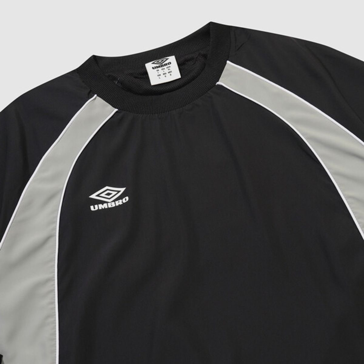 엄브로(UMBRO) NQ 패널 우븐탑 블랙 UR311CWT81
