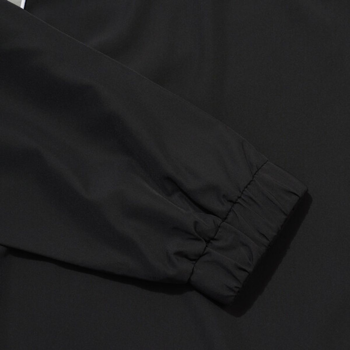 엄브로(UMBRO) NQ 패널 우븐탑 블랙 UR311CWT81