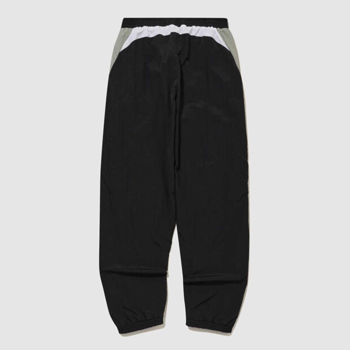 엄브로(UMBRO) NQ 릴렉스 트랙 팬츠 블랙 UR311CPT81