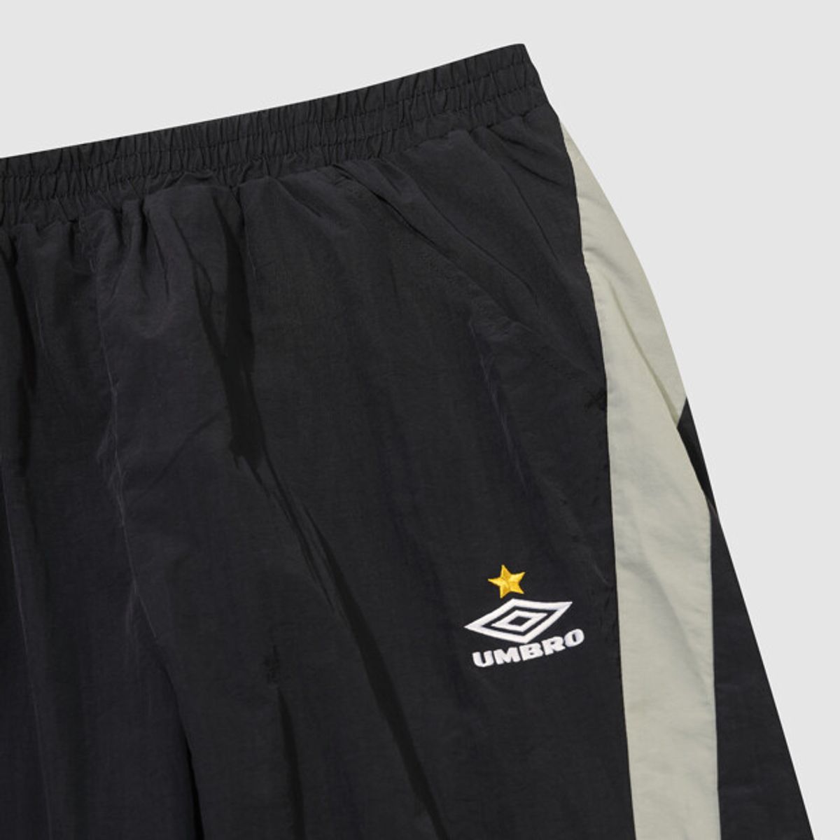 엄브로(UMBRO) NQ 릴렉스 트랙 팬츠 블랙 UR311CPT81