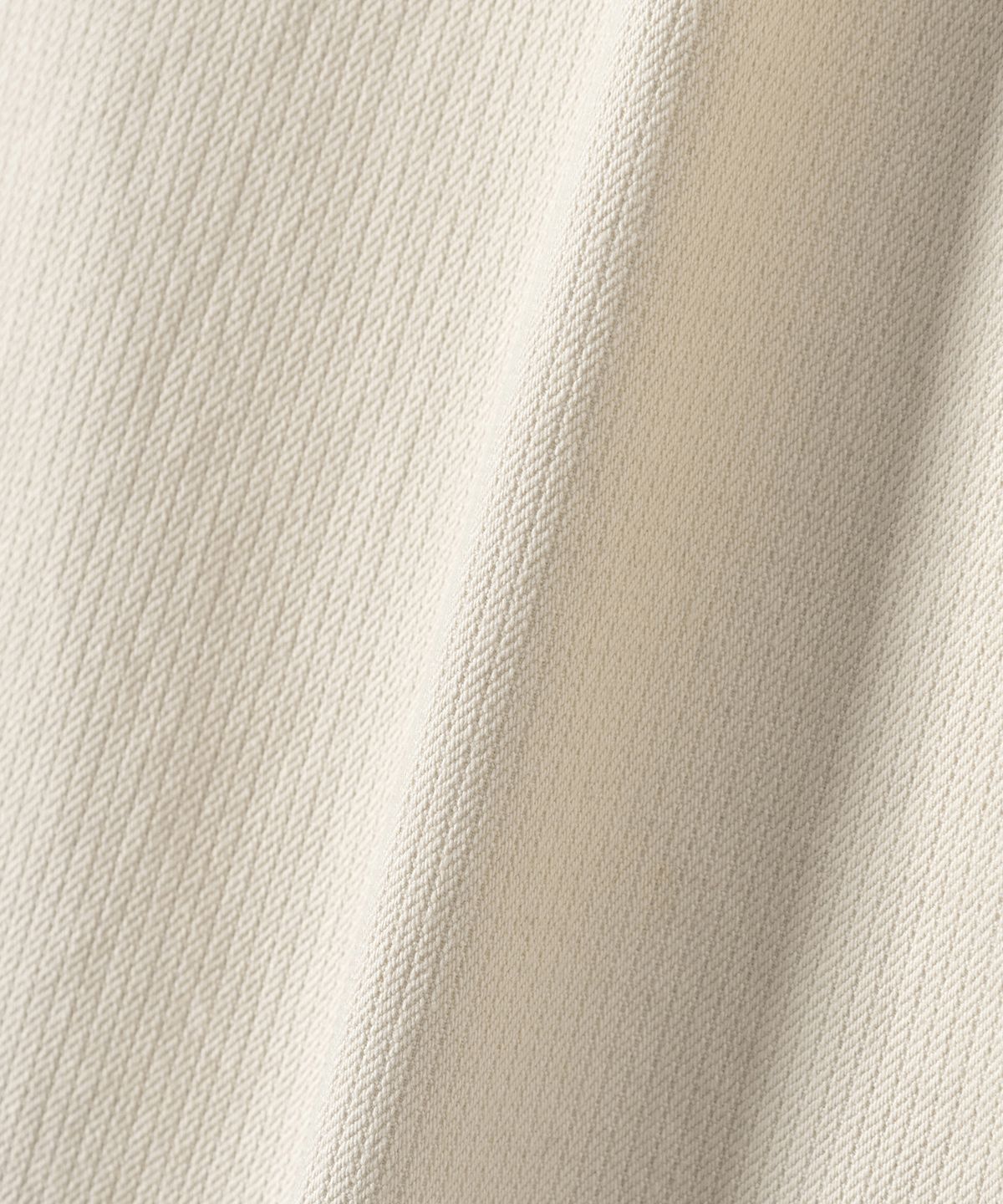 넌블랭크(NONBLANK) 웨일 워시드 커브드 팬츠_CREAM