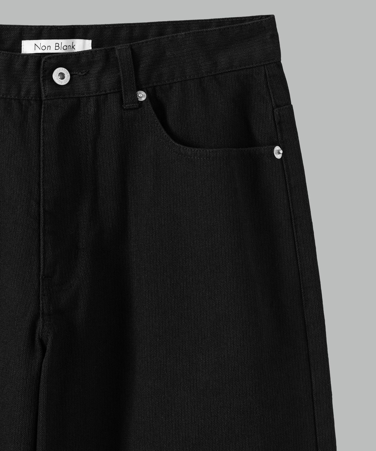 넌블랭크(NONBLANK) 웨일 워시드 커브드 팬츠_BLACK