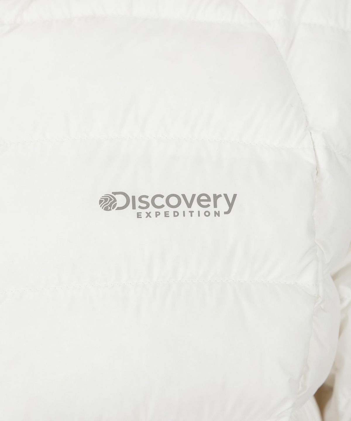 디스커버리 익스페디션(DISCOVERY EXPEDITION) 여성 애슬레져 슬림 다운 경량패딩 (CREAM)
