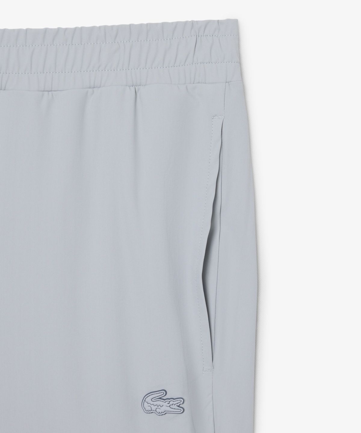 라코스테(LACOSTE) 남성 커뮤터팩 트랙팬츠 XH9208-56N LEP