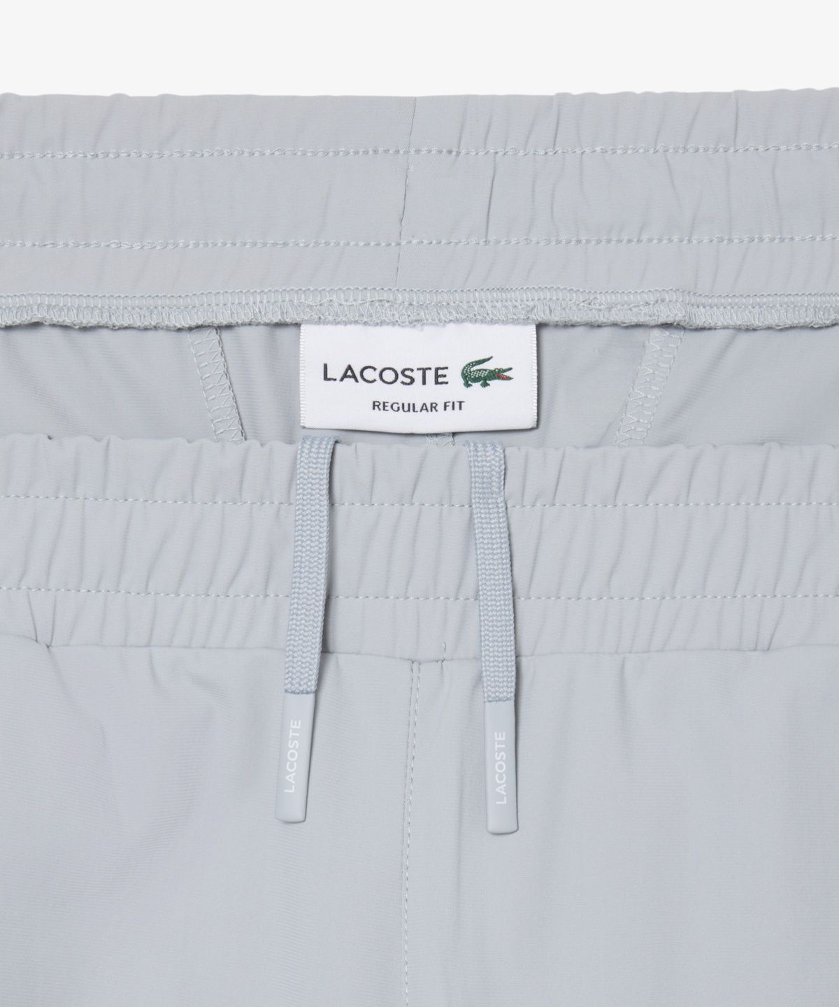 라코스테(LACOSTE) 남성 커뮤터팩 트랙팬츠 XH9208-56N LEP