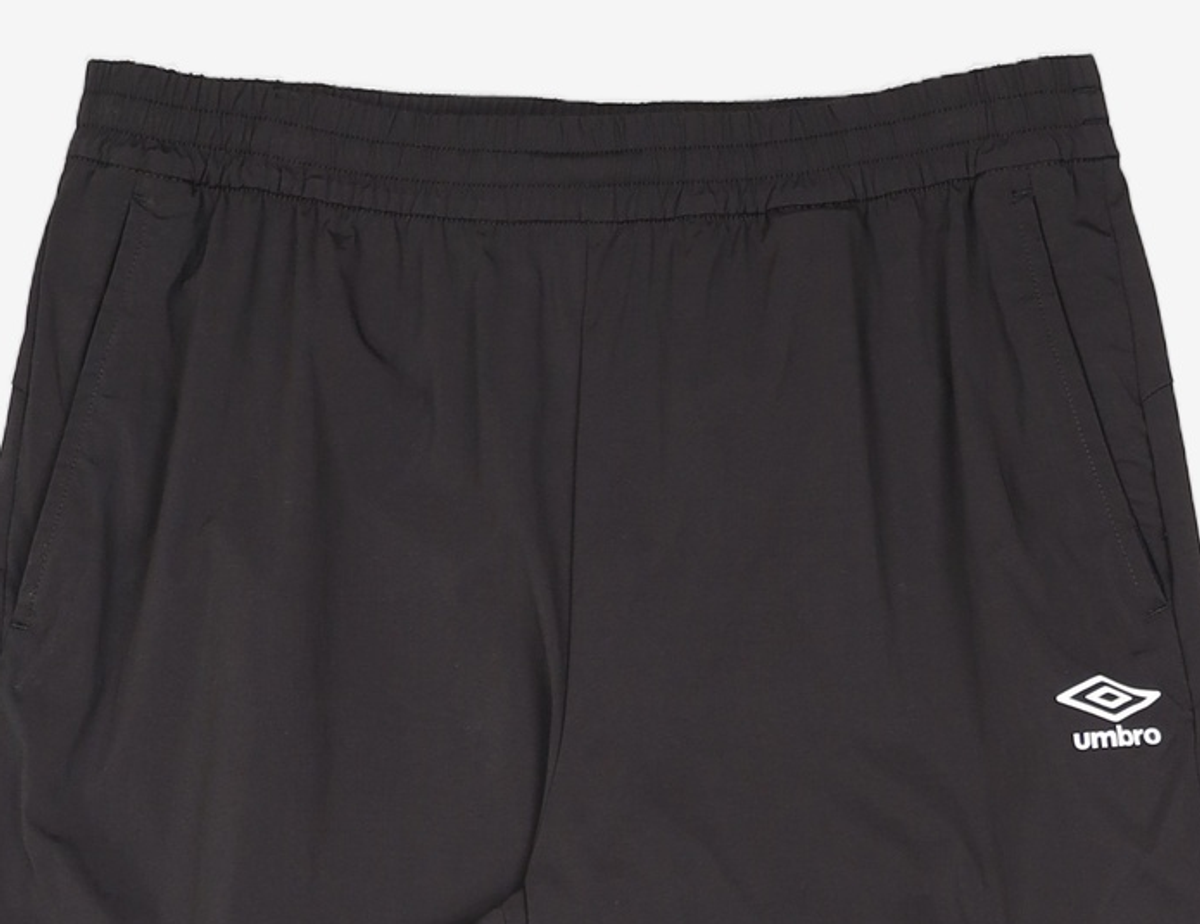 엄브로(UMBRO) PTR 우븐 워밍업 조거 팬츠 블랙 UR121SPT39 M